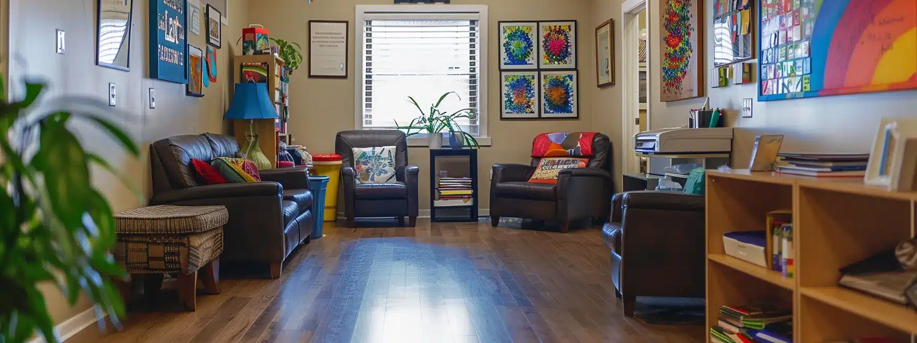 a therapist's cozy office filled with colorful art supplies and comfortable chairs, with a prominent google business listing displayed on the wall.