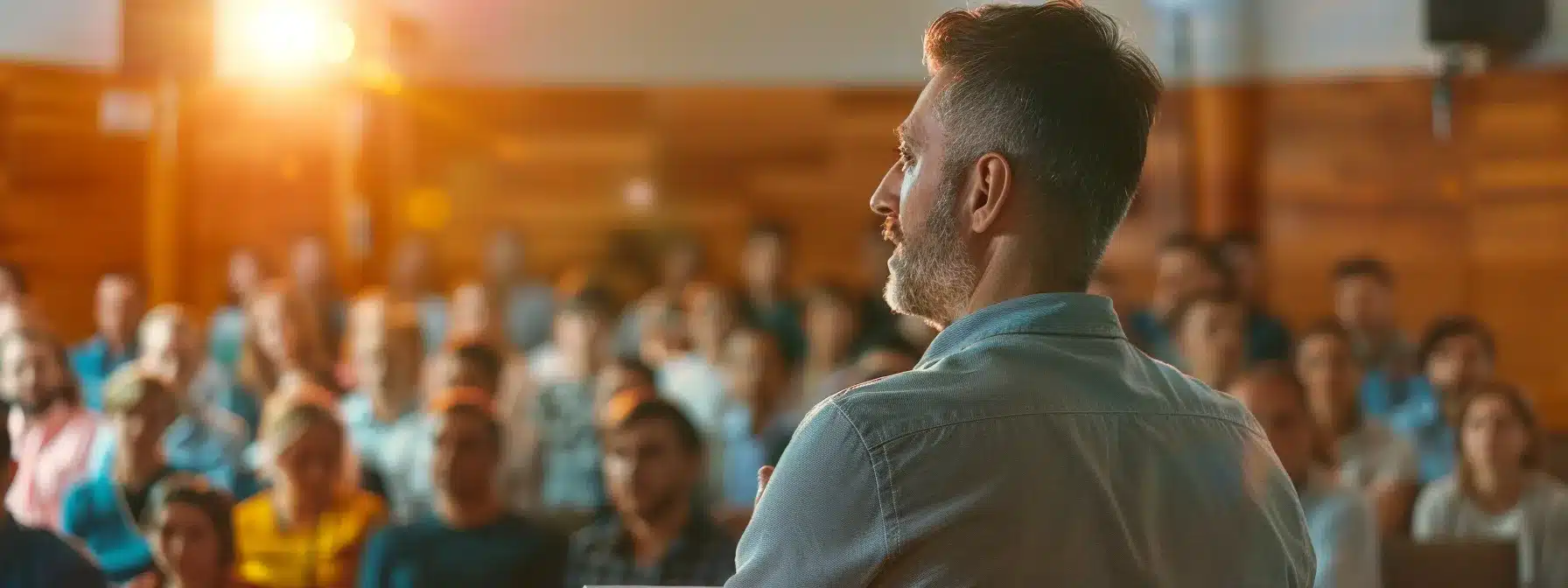 capturing a chiropractor giving a workshop at a local event, surrounded by engaged community members, showcasing expertise and building trust.